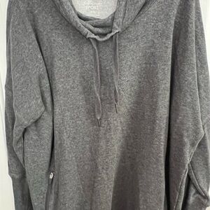 Gray women’s Sweatshirt. Zipper pockets. Has thumb holes. No smoking home.
